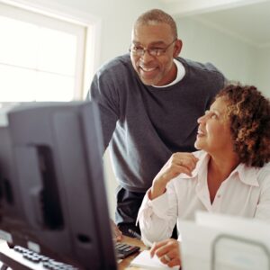 senior couple using a computer